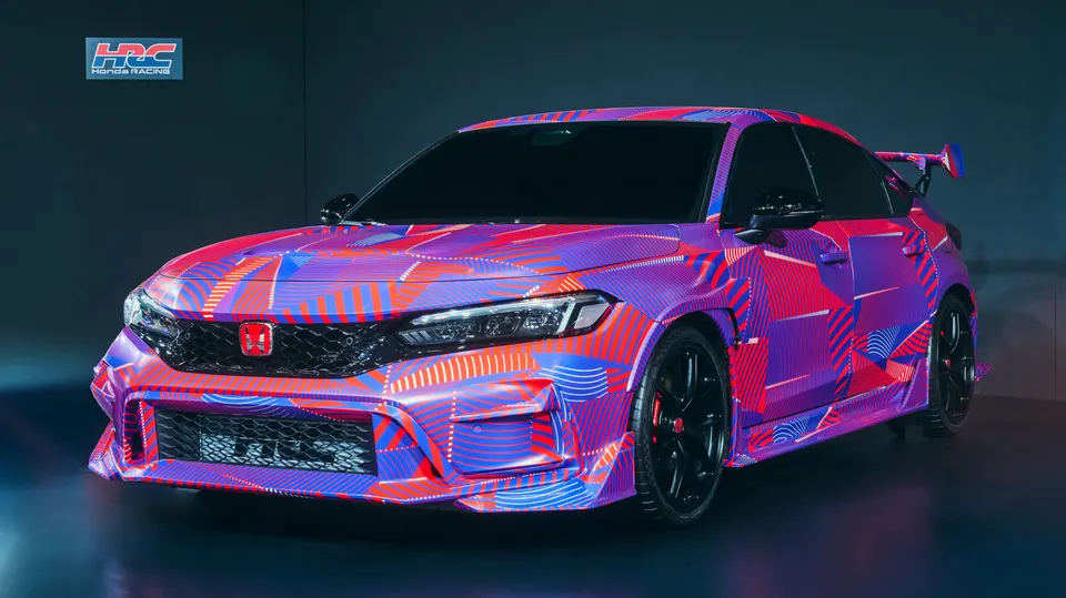 The HRC Civic Type R concept wears a wild camo wrap and aggressive aero in Honda's SEMA display