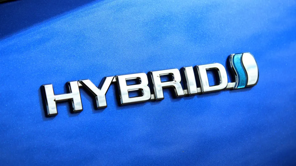 Toyota's hybrid badge has long signaled the brand's fuel-saving focus, now set to improve by 15% with 2027 engines.