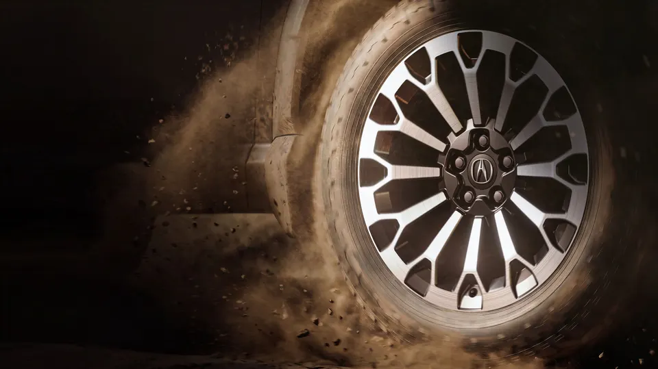 Acura teases the rugged adventure variant with a dust-slinging wheel shot